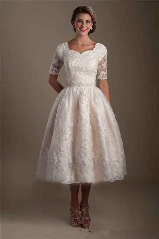 Vintage Champagne Lace Tea Length Modest Wedding Dresses With Half Sleeves Puffy A-line Informal Brides Reception Dresses
Vintage Champagne Lace Tea Length Modest Wedding Dresses With Half Sleeves Puffy A-line Informal Brides Reception Dresses