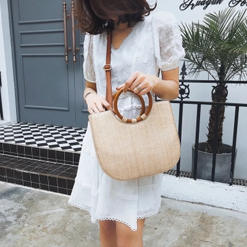 2019 new straw bag ring wooden handle handbag shoulder slung woven women's bag Korean fashion travel beach bag
2019 new straw bag ring wooden handle handbag shoulder slung woven women's bag Korean fashion travel beach bag