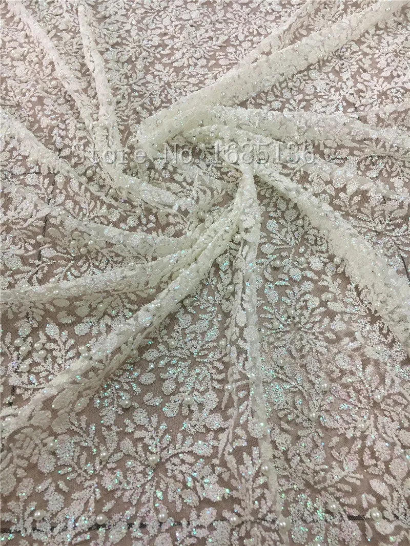 White color bridal french net lace fabric for wedding dress glued glitter beads sequins lace fabric
White color bridal french net lace fabric for wedding dress glued glitter beads sequins lace fabric