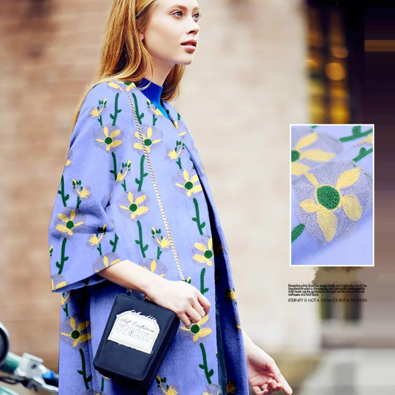 Yellow flower embroidered in the blue wool cloth unique embroidered wool fabric autumn winter characteristics of clothing fabric
Yellow flower embroidered in the blue wool cloth unique embroidered wool fabric autumn winter characteristics of clothing fabric