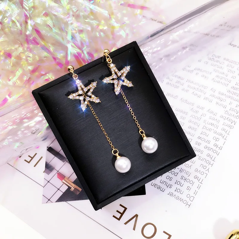 S925 silver needle five-pointed star tassel pearl net red earrings female temperament Korean personality wild earrings
S925 silver needle five-pointed star tassel pearl net red earrings female temperament Korean personality wild earrings