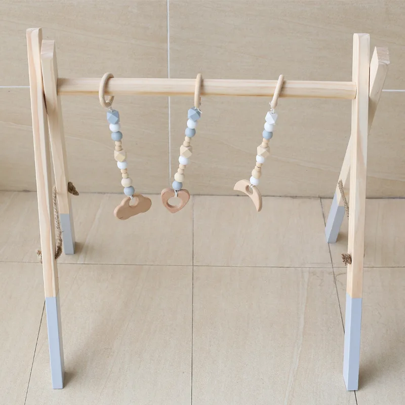 Nordic Nursery Newborn Baby Gym Wooden Play Gym Baby Activity Gym Nursery Baby Wooden Gym Stand Kids Gym With 3PCS Toys
Nordic Nursery Newborn Baby Gym Wooden Play Gym Baby Activity Gym Nursery Baby Wooden Gym Stand Kids Gym With 3PCS Toys