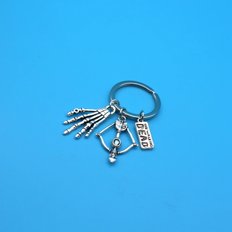 New Fashion KeychainThe Walking Dead Pendants DIY Men Jewelry Car Key Chain Ring Holder Souvenir For Gift bow Bone hand
New Fashion KeychainThe Walking Dead Pendants DIY Men Jewelry Car Key Chain Ring Holder Souvenir For Gift bow Bone hand