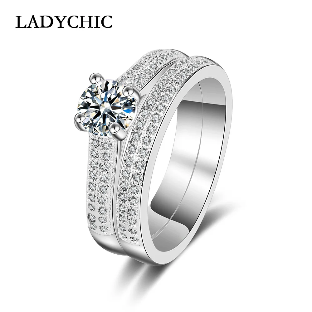 LADYCHIC Double Rings for Lover Couples Men Women White Gold Color Wedding Ring Sets High Quality AAA+ Zircon Inlay LR1025
LADYCHIC Double Rings for Lover Couples Men Women White Gold Color Wedding Ring Sets High Quality AAA+ Zircon Inlay LR1025