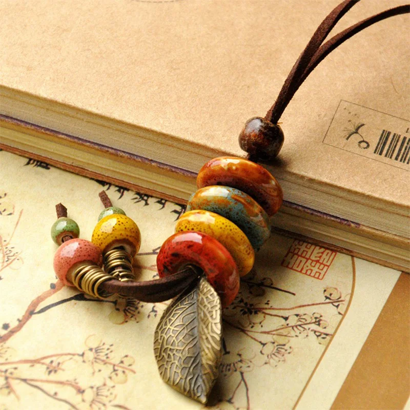 Leather Necklace Ceramic Beads Pendants Leaf Charm Long Sweater Chain Strand Choker Leaves Tassel Women Men Fashion Jewelry
Leather Necklace Ceramic Beads Pendants Leaf Charm Long Sweater Chain Strand Choker Leaves Tassel Women Men Fashion Jewelry