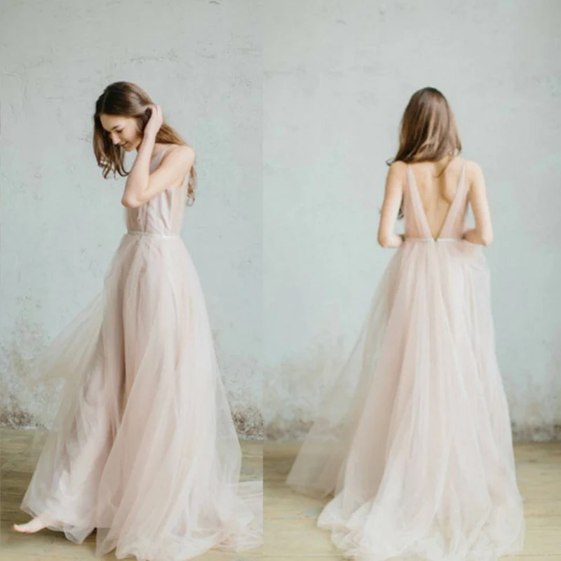 light and airy floor length champagne sleeveless tulle and satin V neck wedding dress 2019 with hand embroidered leaves
light and airy floor length champagne sleeveless tulle and satin V neck wedding dress 2019 with hand embroidered leaves