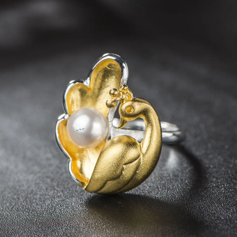 Retro Thai S925 Sterling Silver Ring Wholesale Peacock Beautiful Jewelry Natural Freshwater Pearl Women Open Ended Ring
Retro Thai S925 Sterling Silver Ring Wholesale Peacock Beautiful Jewelry Natural Freshwater Pearl Women Open Ended Ring