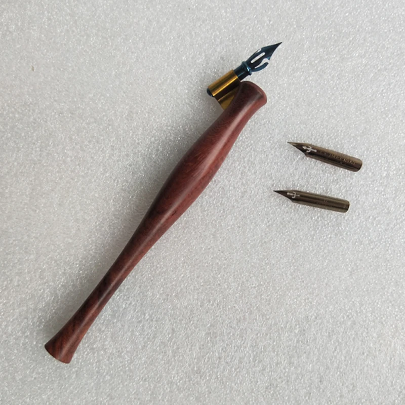 Handmade Solid Wood Oblique Calligraphy Copperplate Script Antique Dip Pen Set with 1 Pen Holder 3 Nibs Dip Pens
Handmade Solid Wood Oblique Calligraphy Copperplate Script Antique Dip Pen Set with 1 Pen Holder 3 Nibs Dip Pens