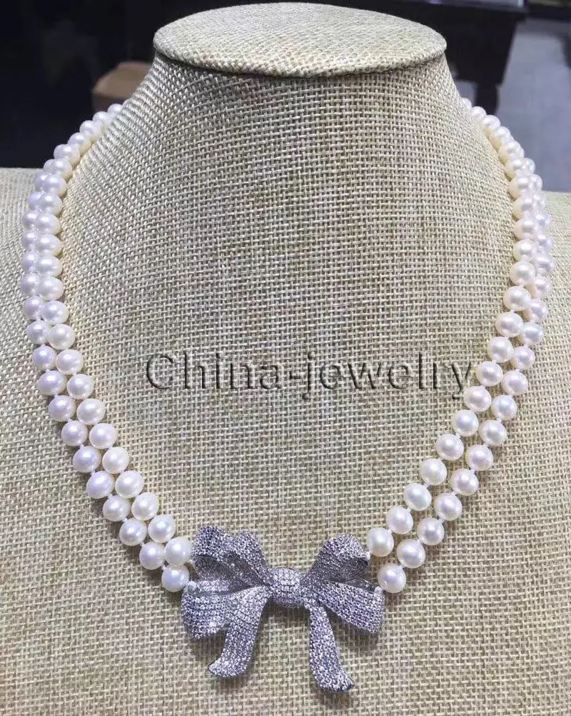 2row 19-20" 8-9mm white round freshwater pearl necklace - zircon bowknot >Selling jewerly free shipping
2row 19-20" 8-9mm white round freshwater pearl necklace - zircon bowknot >Selling jewerly free shipping