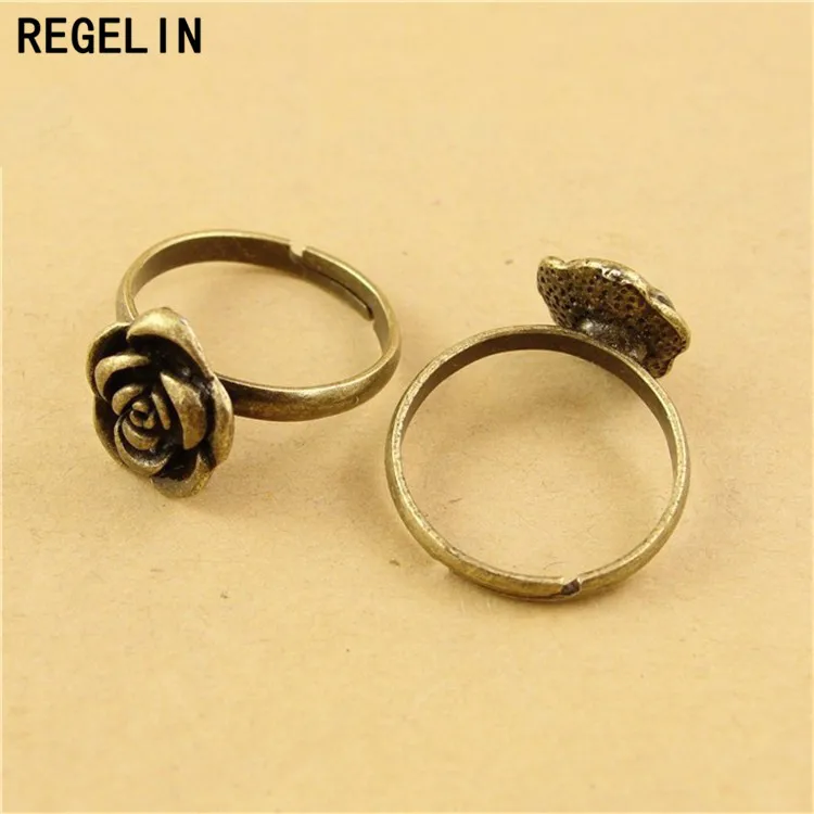 REGELIN 20 шт./лот Регулируемый античный бронзовый цветок кольца для женщин для вечеринки свадьбы ювелирный подарок на палец ювелирные изделия ...
REGELIN 20 шт./лот Регулируемый античный бронзовый цветок кольца для женщин для вечеринки свадьбы ювелирный подарок на палец ювелирные изделия ...