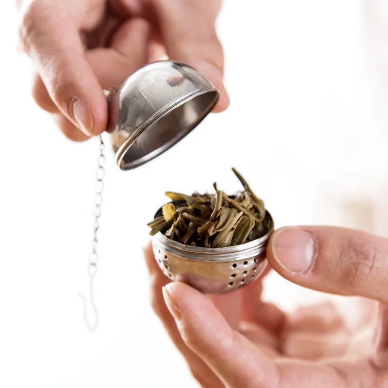 1PC New Stainless Steel Ball Tea Infuser Mesh Filter Strainer w/hook Loose Tea Leaf Spice Home Kitchen Accessories U3
1PC New Stainless Steel Ball Tea Infuser Mesh Filter Strainer w/hook Loose Tea Leaf Spice Home Kitchen Accessories U3
