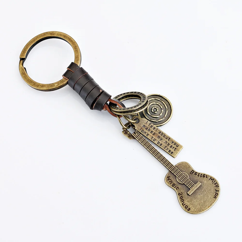 Vintage Alloy guitar violin Keychain Leather Car keyrings Pendants for Man Jewelry Father gifts
Vintage Alloy guitar violin Keychain Leather Car keyrings Pendants for Man Jewelry Father gifts