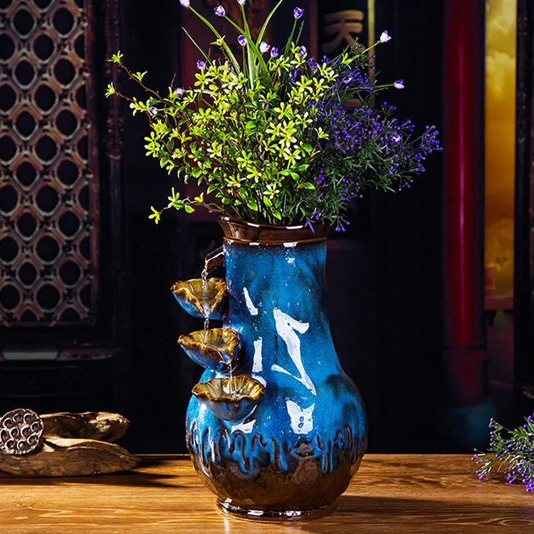 Ceramic water fountain humidifier Zhaocai desktop decoration living room decorative vase simple creative craft ornaments
Ceramic water fountain humidifier Zhaocai desktop decoration living room decorative vase simple creative craft ornaments