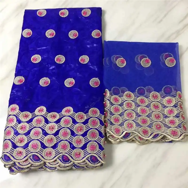 African Lace Fabric Shadda Bazin Riche Fabric new design Embroidered 5yards Bazin Riche With 2yard Tulle Lace for dress
African Lace Fabric Shadda Bazin Riche Fabric new design Embroidered 5yards Bazin Riche With 2yard Tulle Lace for dress