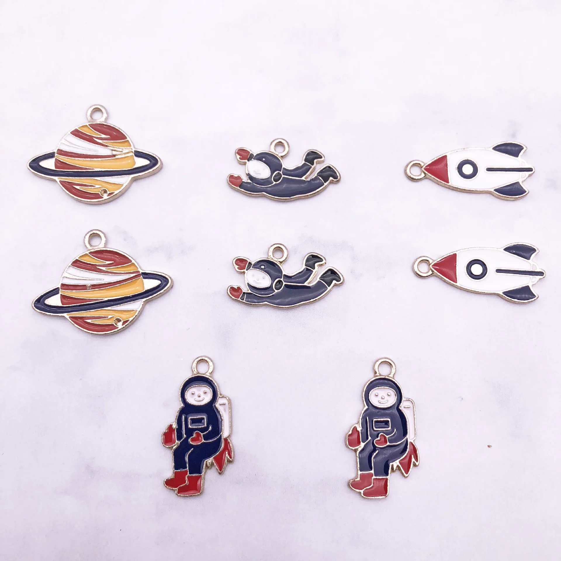 

10Pcs/Lot DIY Jewelry Accessories Enamel Rocket Astronauts Planet Charms Drop Oil Alloy Earrings Necklace Pendant