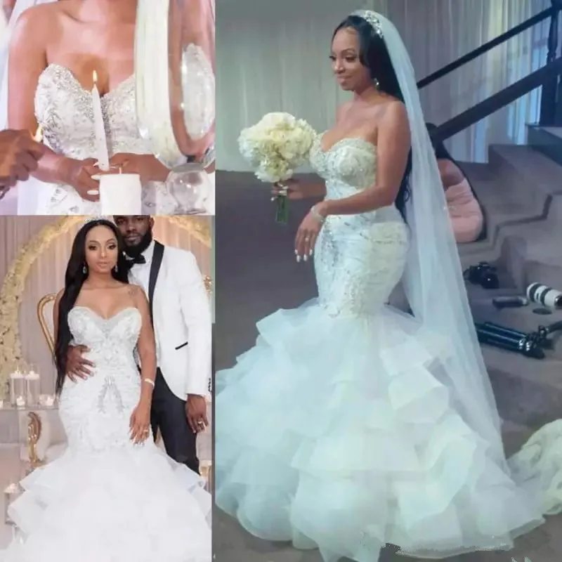Luxury Crystal Beaded South African Mermaid Wedding Dresses With Tiered Skirts Floor Length bridal wedding gown Vestido De Nova
Luxury Crystal Beaded South African Mermaid Wedding Dresses With Tiered Skirts Floor Length bridal wedding gown Vestido De Nova