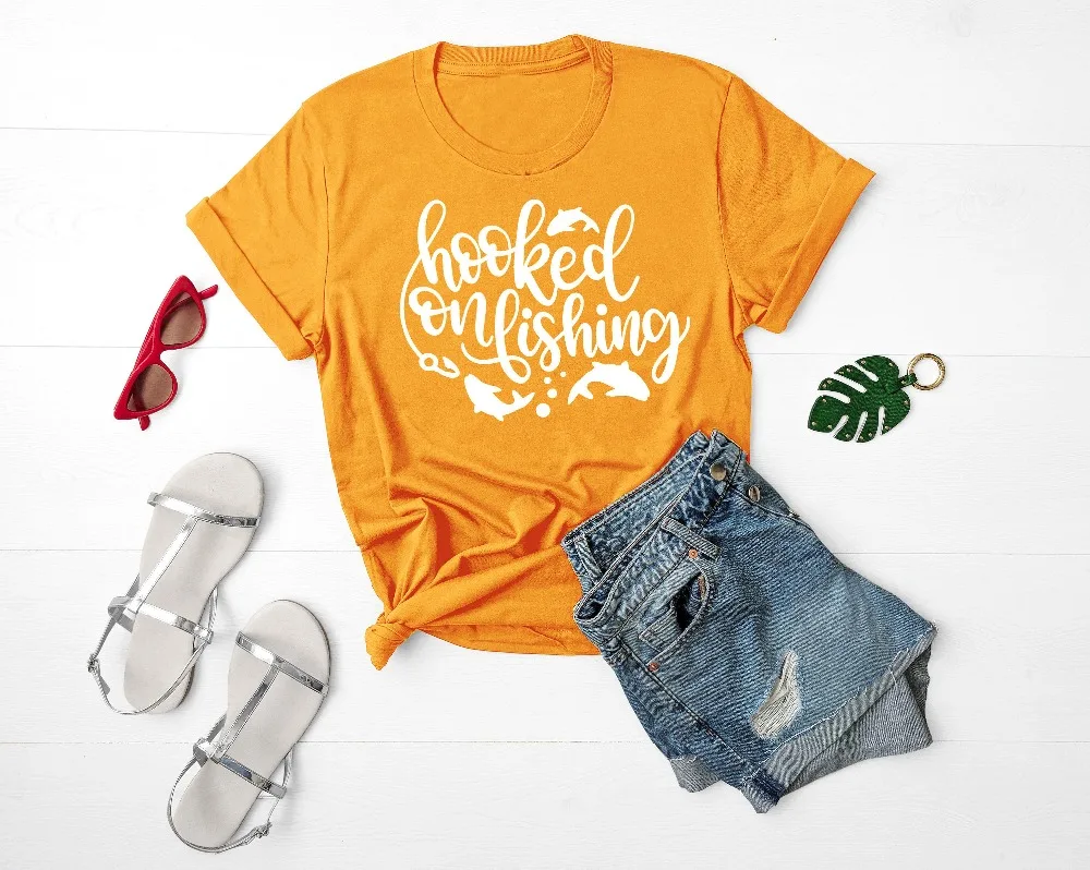Fishing Shirt for Women Hooked on fishing tshirt summer fish unisex tee camping adventure hiking happy slogan aesthetic art tops
Fishing Shirt for Women Hooked on fishing tshirt summer fish unisex tee camping adventure hiking happy slogan aesthetic art tops