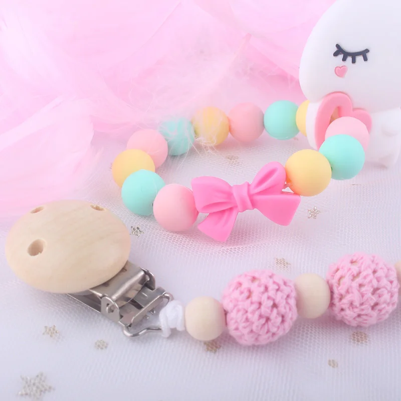 XCQGH Crochet Beads Wooden Pacifier Clip and Cute Rabbit Baby Teether Bracelet Ring for Newborn Baby Nursing Chew 
XCQGH Crochet Beads Wooden Pacifier Clip and Cute Rabbit Baby Teether Bracelet Ring for Newborn Baby Nursing Chew