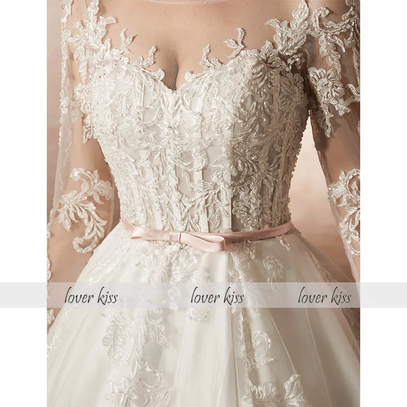 Lover Kiss Vestido De Noiva 2021 Wedding Dress Luxury Long Sleeves O-Neck Beaded Lace Bridal Gowns Bride Dress Robe de Mariage
Lover Kiss Vestido De Noiva 2021 Wedding Dress Luxury Long Sleeves O-Neck Beaded Lace Bridal Gowns Bride Dress Robe de Mariage