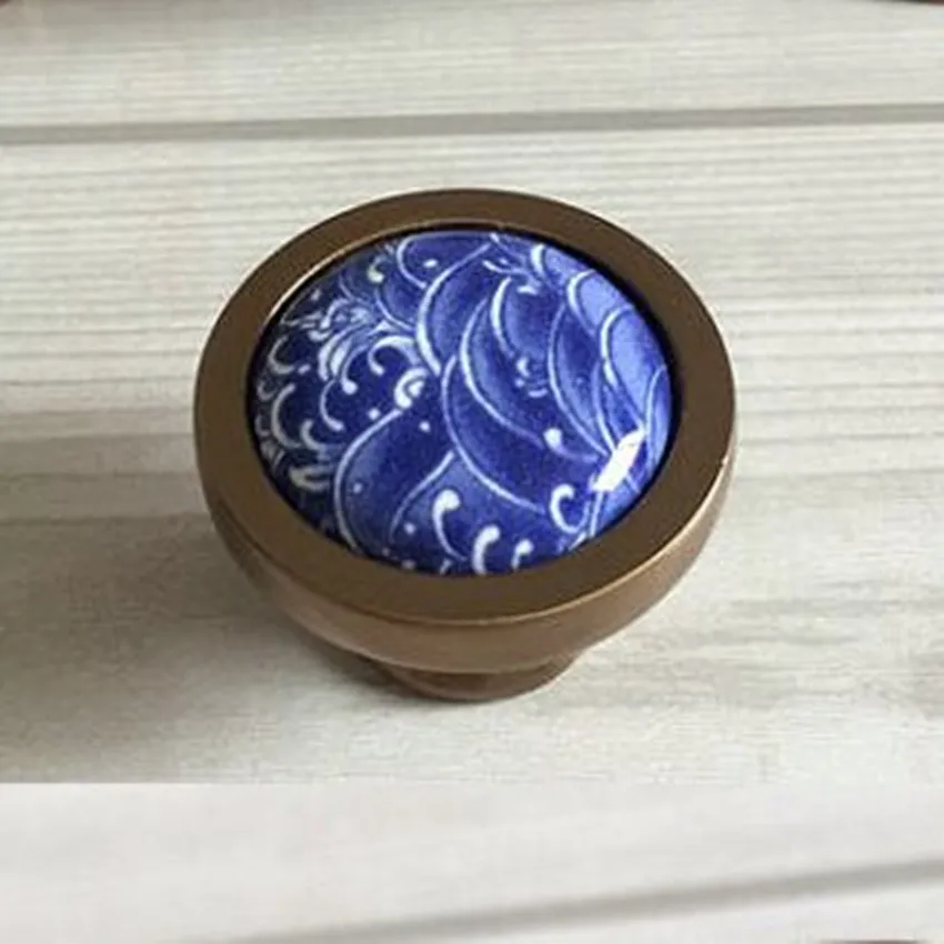 Creative fashion vintage bronze furniture knob white and blue porcelain drawer cabinet knob antique brass ceramic dresser pull
Creative fashion vintage bronze furniture knob white and blue porcelain drawer cabinet knob antique brass ceramic dresser pull
