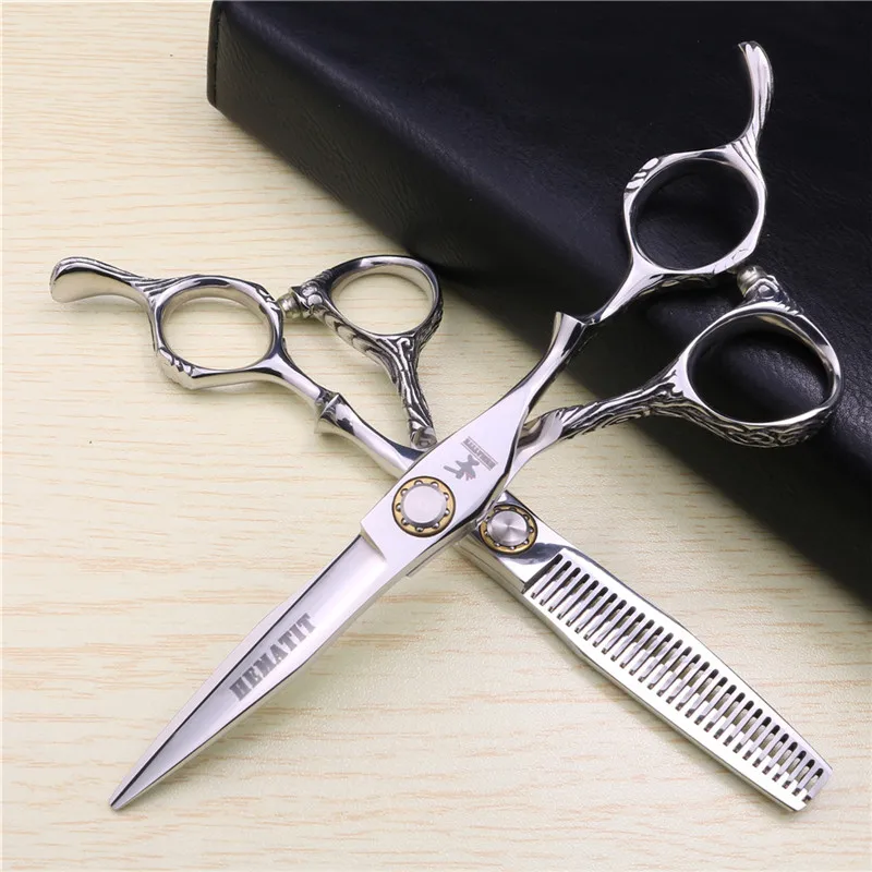 Japan 440C steel high-end bearing hairdressing scissors 6 inch hairdressing scissors tool set cutting thinning scissors
Japan 440C steel high-end bearing hairdressing scissors 6 inch hairdressing scissors tool set cutting thinning scissors
