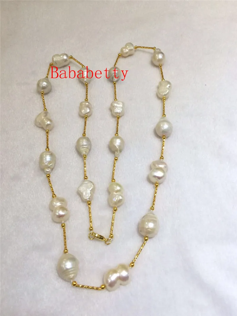 NEW 12-15mm natural white Nucleated Irregular shaped Flameball baroque pearls Necklace 30 inches
NEW 12-15mm natural white Nucleated Irregular shaped Flameball baroque pearls Necklace 30 inches