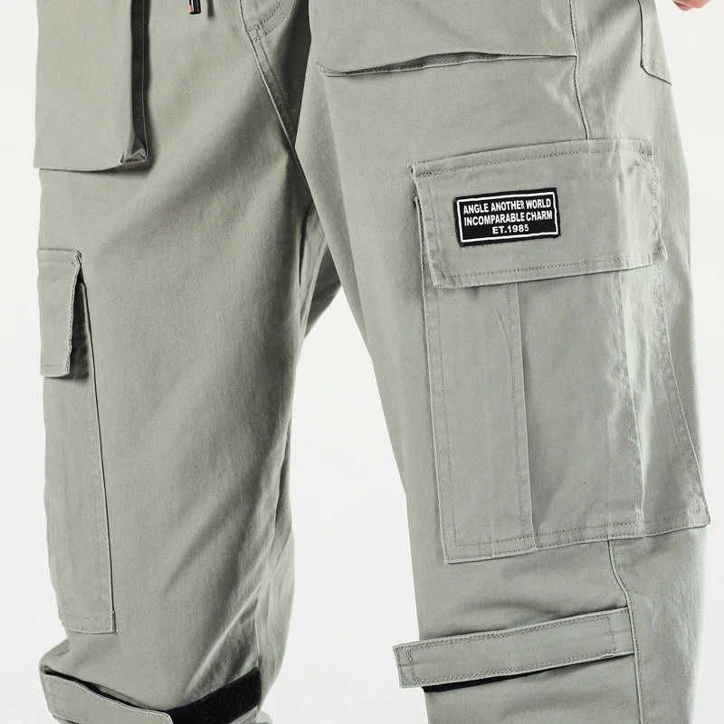 Hip Hop Men Pantalones Hombre Casual Cargo Pants Many Pockets Trousers Harajuku Sweatpants Pants Streetwear Trousers Men Clothes
Hip Hop Men Pantalones Hombre Casual Cargo Pants Many Pockets Trousers Harajuku Sweatpants Pants Streetwear Trousers Men Clothes