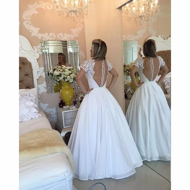 Bride Dress Vestido de noiva Robe de mariage Vintage short Sleeve Lace Ball Gown Wedding Dress V-neck pearls wedding gown
Bride Dress Vestido de noiva Robe de mariage Vintage short Sleeve Lace Ball Gown Wedding Dress V-neck pearls wedding gown