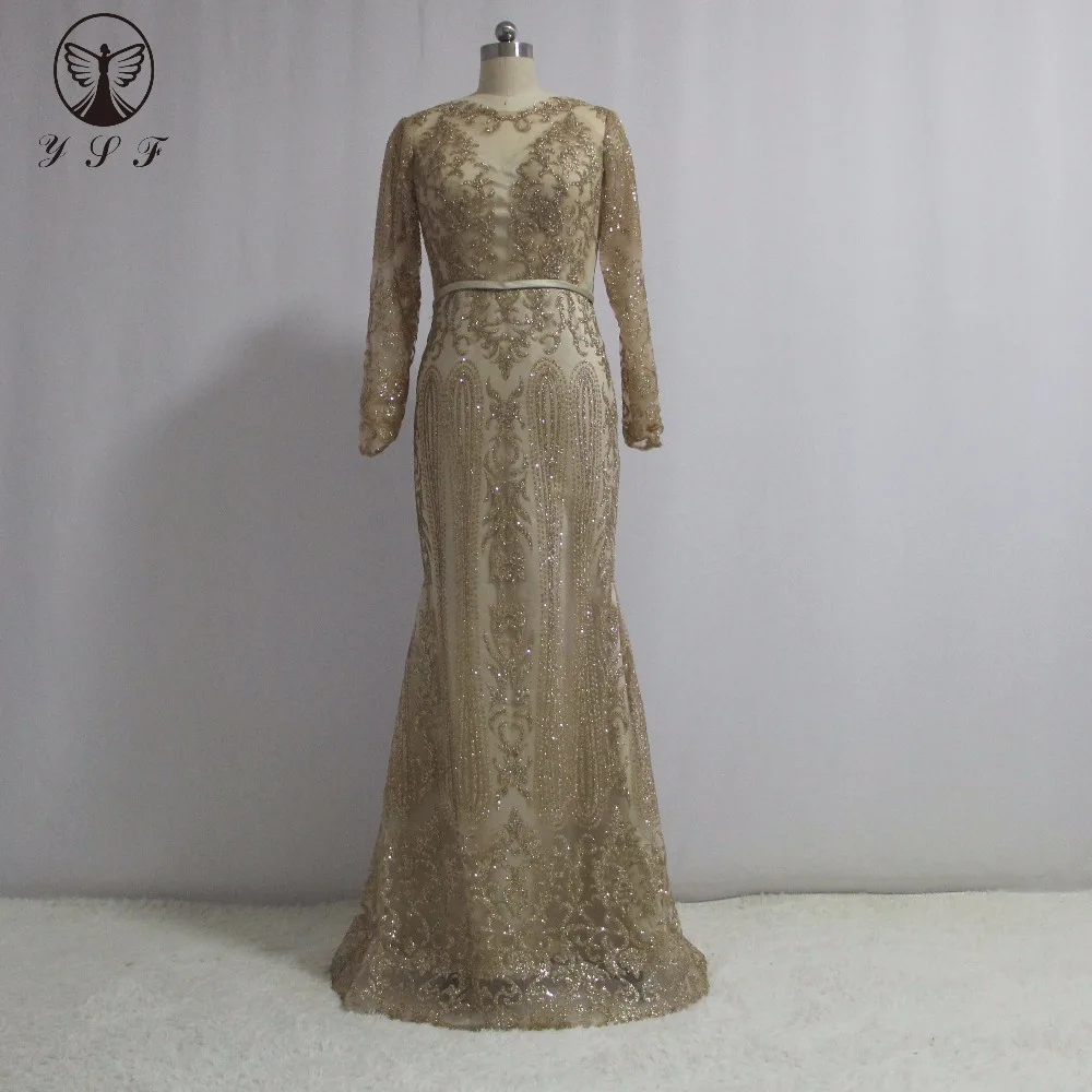 Мода Vestidos De Formature цвета шампанского с О-образным вырезом Кружева Русалка с длинным рукавом Bling Выпускные платья 2017
Мода Vestidos De Formature цвета шампанского с О-образным вырезом Кружева Русалка с длинным рукавом Bling Выпускные платья 2017