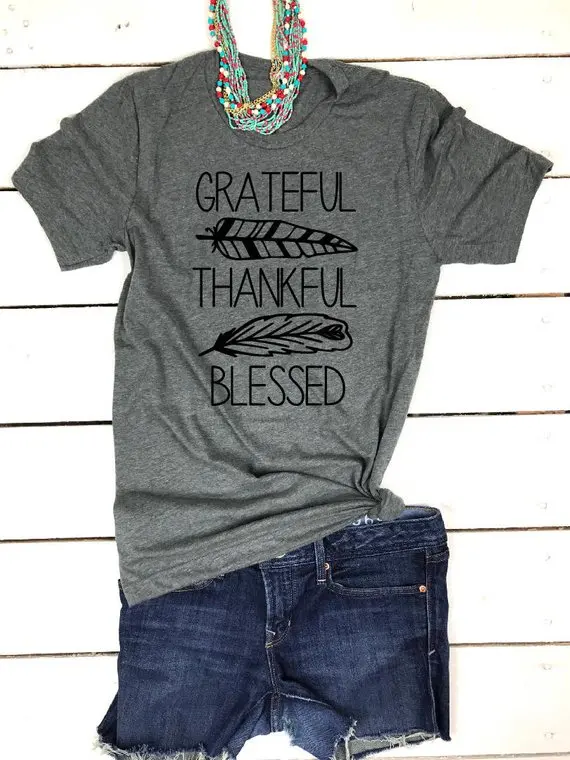 GRATEFUL THANKFUL BLESSED T-shirt Feather graphic Christian slogan 90s women fashion tees Baptism believer tops unisex art shirt
GRATEFUL THANKFUL BLESSED T-shirt Feather graphic Christian slogan 90s women fashion tees Baptism believer tops unisex art shirt
