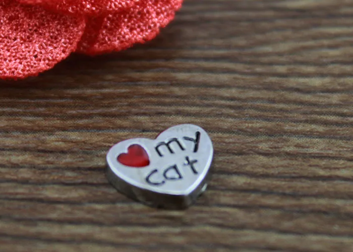 Hot selling 100pcs/lot love my cat heart floating charms living glass memory floating lockets diy jewelry pendant
Hot selling 100pcs/lot love my cat heart floating charms living glass memory floating lockets diy jewelry pendant