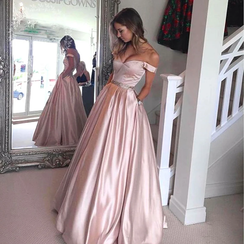 2017 Pearl Pink Long Evening Gowns with Pocket Off the Shoulder A Line Robe de soiree Abendkleider Beaded Sash Formal Prom Gown
2017 Pearl Pink Long Evening Gowns with Pocket Off the Shoulder A Line Robe de soiree Abendkleider Beaded Sash Formal Prom Gown