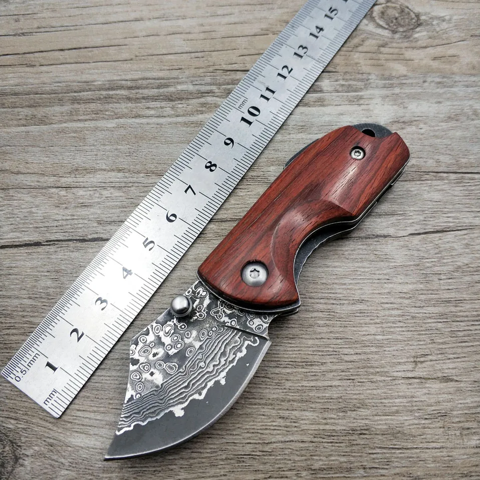 Dropshipping miniDamascus steel blade pocket folding knife outdoor survival knifeUtility knife camping knife
Dropshipping miniDamascus steel blade pocket folding knife outdoor survival knifeUtility knife camping knife