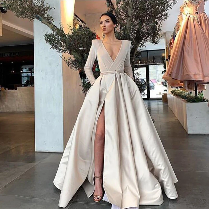 Arabic Dubai Style Long Sleeve Evening Dresses 2021 V-neck Satin Sexy High Slit Long Formal Evening Gowns
Arabic Dubai Style Long Sleeve Evening Dresses 2021 V-neck Satin Sexy High Slit Long Formal Evening Gowns