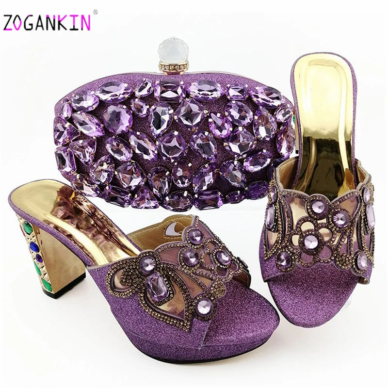 Light Purple African Slippers with Matching Bag for Woman African Party Shoes and Bag Set African Wedding Shoes with Crystal
Light Purple African Slippers with Matching Bag for Woman African Party Shoes and Bag Set African Wedding Shoes with Crystal