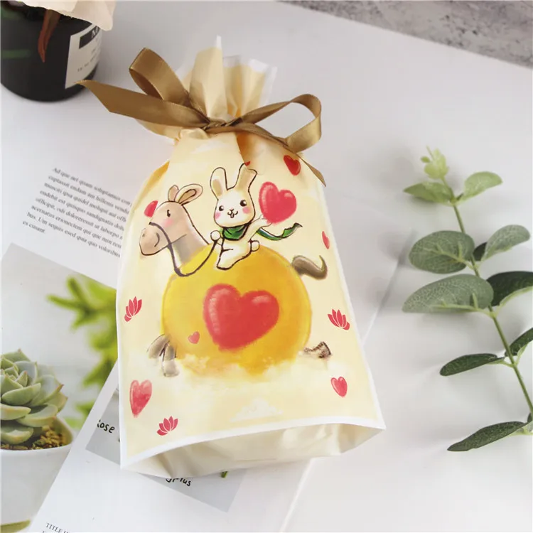 10pcs/lot yellow Rabbit heart plastic bags packaging bags Drawstring Bag Candy Bag 14.8x23.5cm
10pcs/lot yellow Rabbit heart plastic bags packaging bags Drawstring Bag Candy Bag 14.8x23.5cm