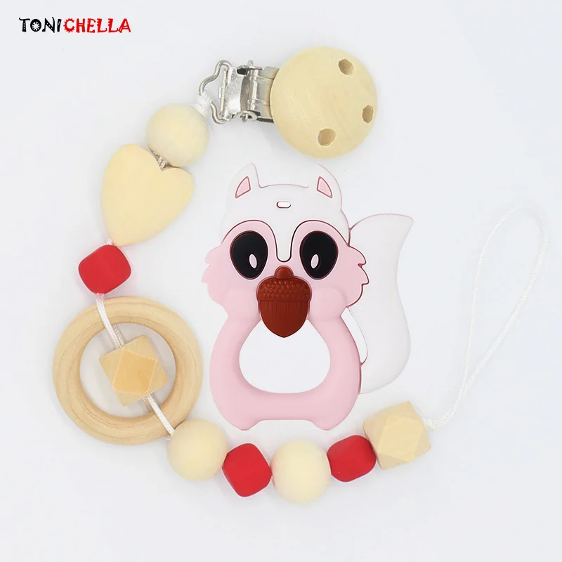 Baby Silicone Teether Newborn Teething Infant Training Soother Cute Squirrel Pacifier Wood Chain Toy Children Teeth Gifts T0557
Baby Silicone Teether Newborn Teething Infant Training Soother Cute Squirrel Pacifier Wood Chain Toy Children Teeth Gifts T0557