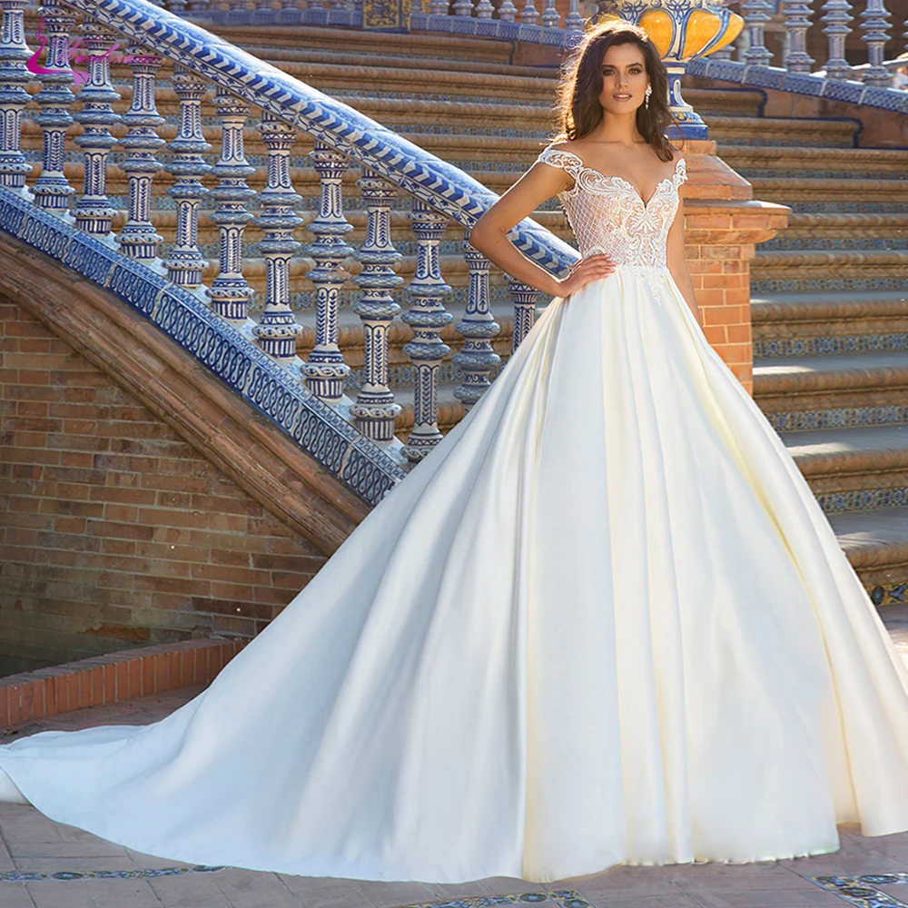 Waulizane Exquisite V-Neckline A Line Wedding Dress Of Elegant Satin Skirt Of Cap Sleeve
Waulizane Exquisite V-Neckline A Line Wedding Dress Of Elegant Satin Skirt Of Cap Sleeve