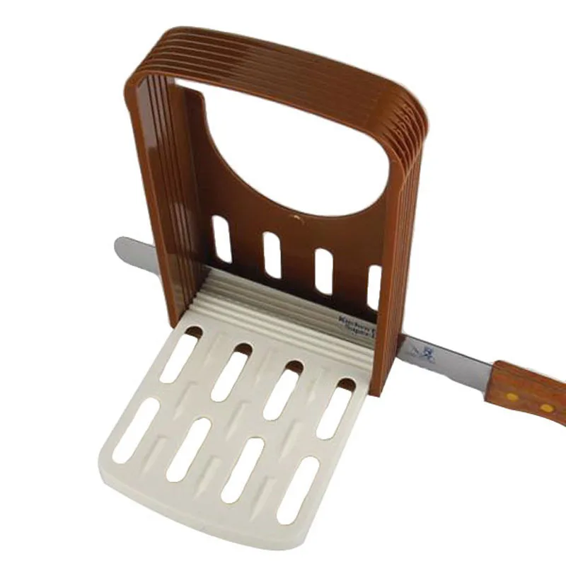 Toast Bread Slicer Plastic Foldable Loaf Cutter Rack Cutting Guide Slicing Tools Kitchen Accessories
Toast Bread Slicer Plastic Foldable Loaf Cutter Rack Cutting Guide Slicing Tools Kitchen Accessories