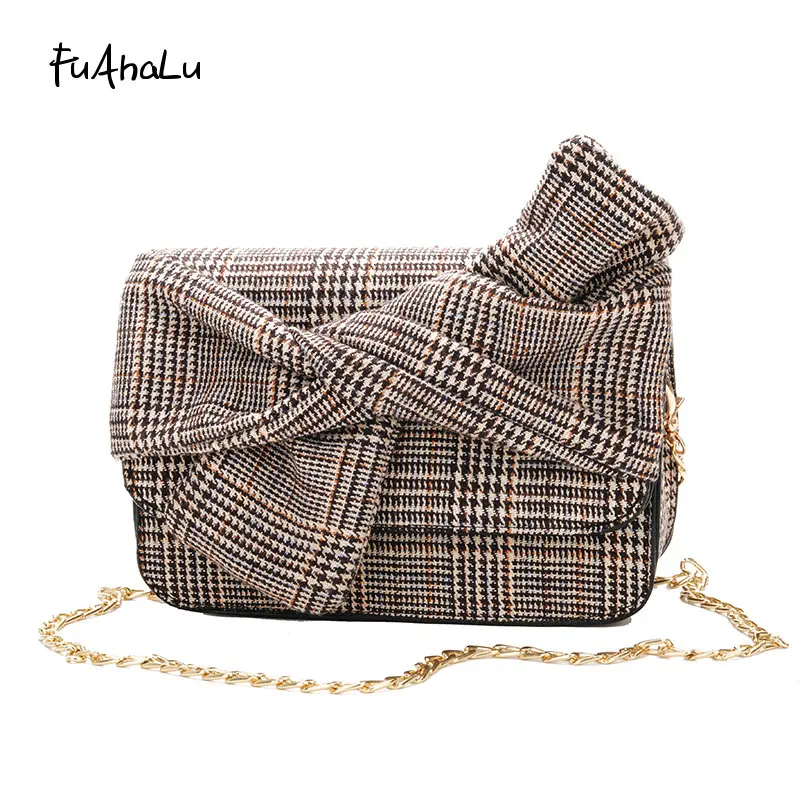 FuAhaLu Autumn new chain shoulder bag Korean version of the wild Messenger bag lattice British wind small square bag
FuAhaLu Autumn new chain shoulder bag Korean version of the wild Messenger bag lattice British wind small square bag