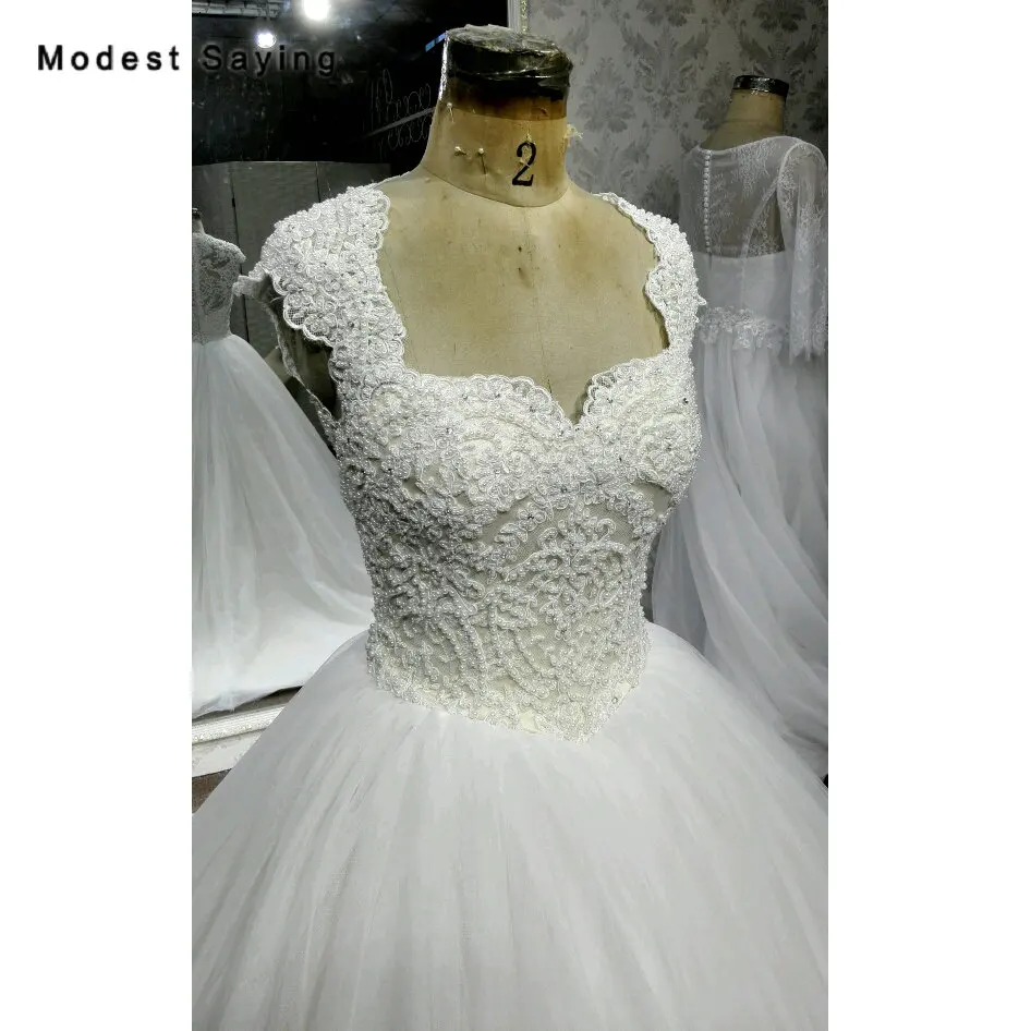 Real Elegant Ivory Ball Gown Pearls Lace Wedding Dresses 2018 with Champagne Lining Sweetheart Bridal Gowns vestidos de noiva
Real Elegant Ivory Ball Gown Pearls Lace Wedding Dresses 2018 with Champagne Lining Sweetheart Bridal Gowns vestidos de noiva