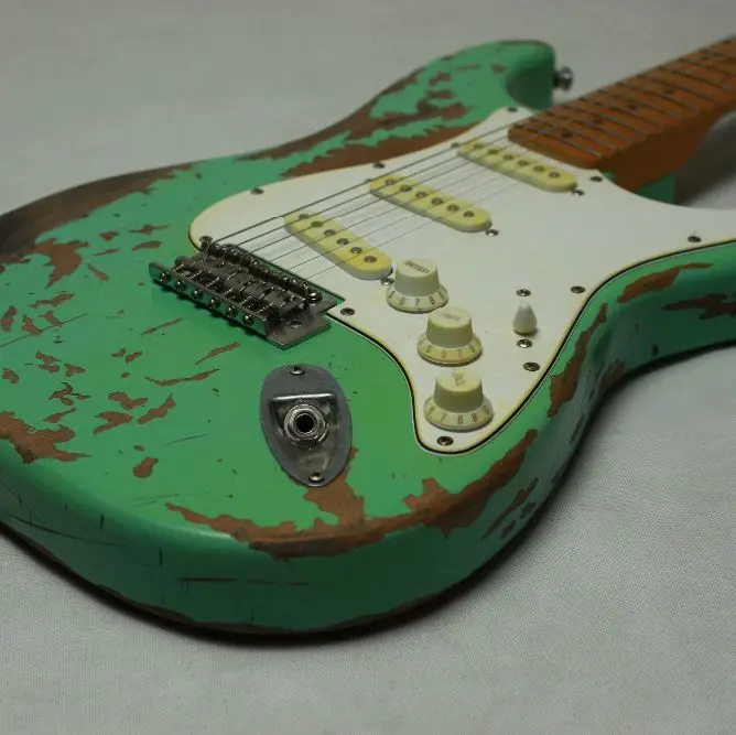 New Favorite Surf green 100% handmade Relic electric guitar alder body Aged hardware profession Do Relic guitars
New Favorite Surf green 100% handmade Relic electric guitar alder body Aged hardware profession Do Relic guitars
