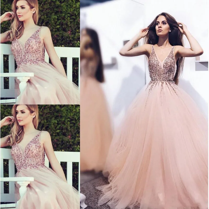 2018 Luxurious A-line Arabic Evening Gowns V-neck Tulle Beaded Sequins Special Occasion Dresses Middle East Fashion Party Dress
2018 Luxurious A-line Arabic Evening Gowns V-neck Tulle Beaded Sequins Special Occasion Dresses Middle East Fashion Party Dress