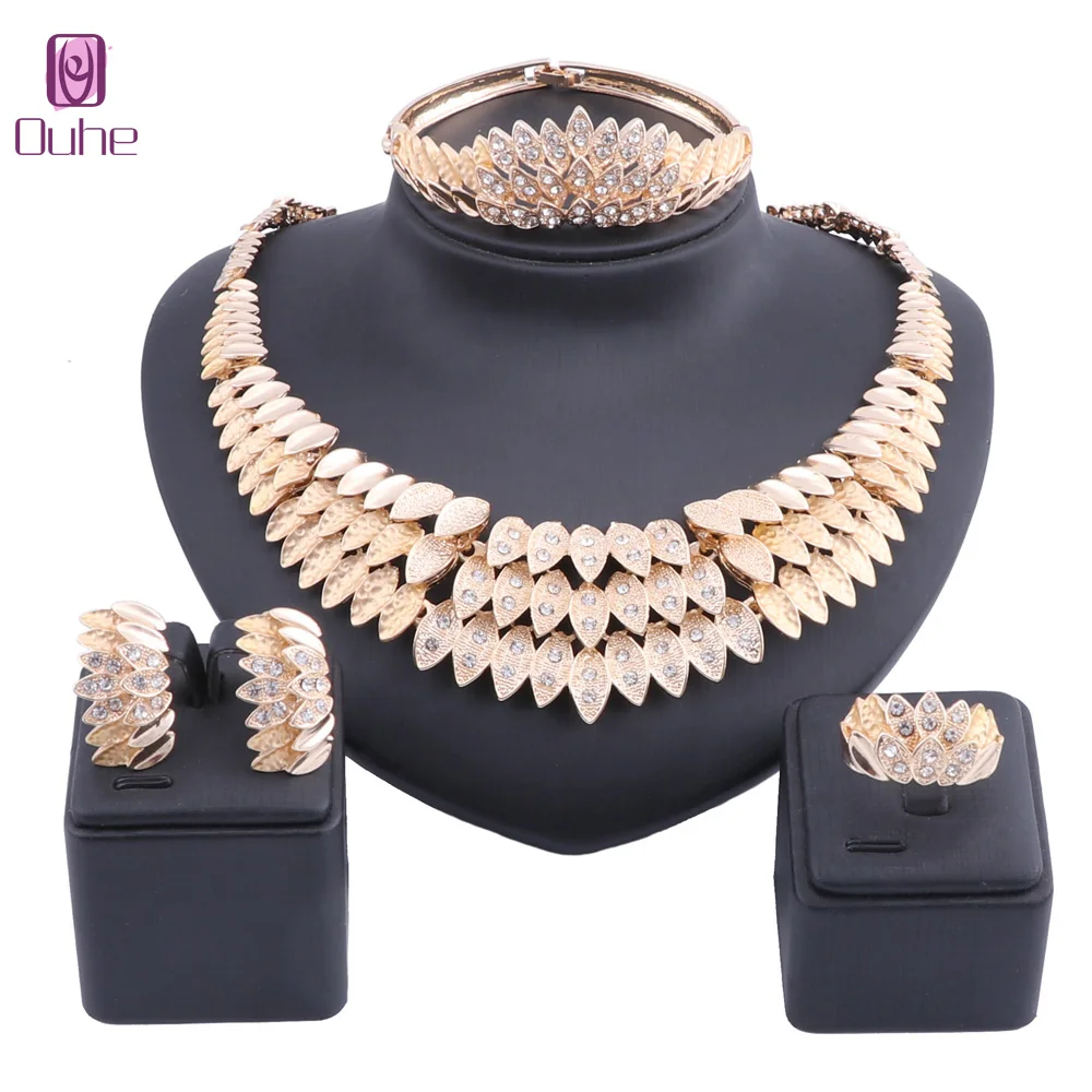 Fashion Italian Jewelry Set Exquisite Dubai Gold Color Crystal Necklace Earring Ring Jewelry Set Nigerian Wedding Bridal Bijoux
Fashion Italian Jewelry Set Exquisite Dubai Gold Color Crystal Necklace Earring Ring Jewelry Set Nigerian Wedding Bridal Bijoux