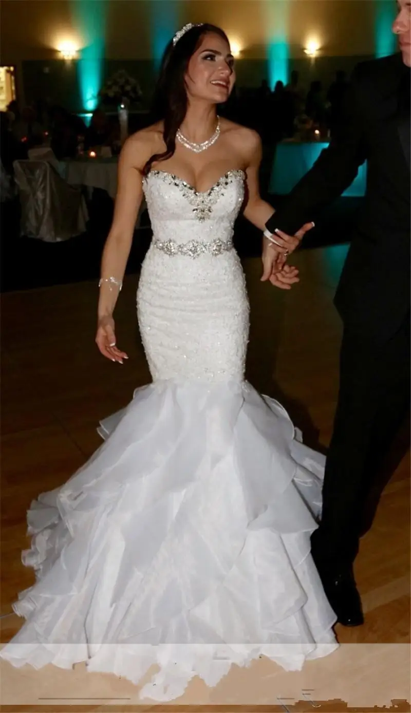 Charming Sweetheart Beaded Mermaid Wedding Dresses 2021 Organza Sweep Train Ruffles Bridal Gowns Custom Made
Charming Sweetheart Beaded Mermaid Wedding Dresses 2021 Organza Sweep Train Ruffles Bridal Gowns Custom Made