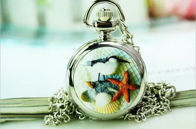Wholesale 10 PCS/lot Fashion elegant quality quartz starfish shells women pocket watch necklace
Wholesale 10 PCS/lot Fashion elegant quality quartz starfish shells women pocket watch necklace