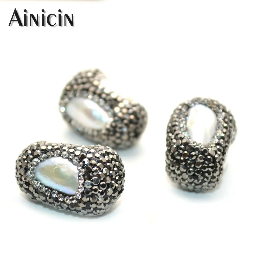 15x25mm Oval Shape Black Rhinestone Crystal Paved Rugby Natural Freshwater Pearl DIY Jewelry Making Beads 10pcs/lot
15x25mm Oval Shape Black Rhinestone Crystal Paved Rugby Natural Freshwater Pearl DIY Jewelry Making Beads 10pcs/lot