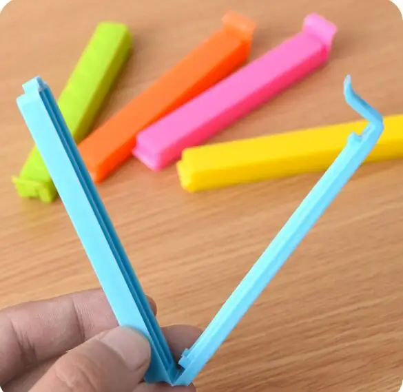 5pcs/lot Food Snack Storage Seal Sealing Bag Clips Sealer Clamp Plastic Keeping Food Fresh Sealing Clips kitchen Tools LF 185
5pcs/lot Food Snack Storage Seal Sealing Bag Clips Sealer Clamp Plastic Keeping Food Fresh Sealing Clips kitchen Tools LF 185