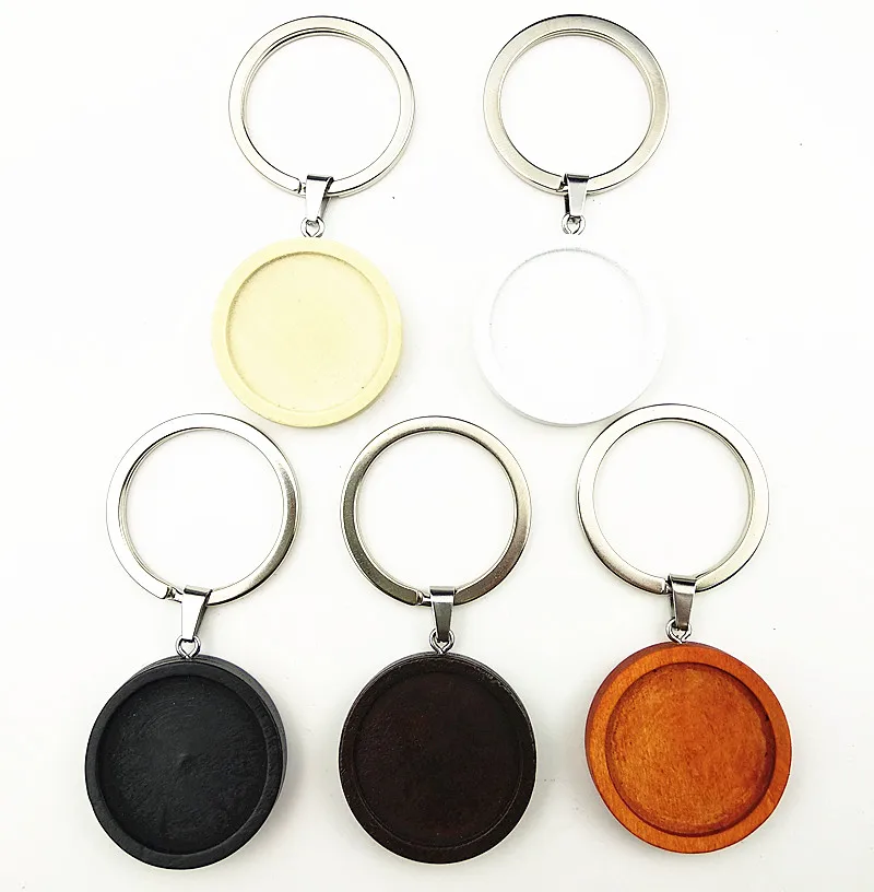 New style24pcs Dark brown,black,white,log wood cabochon trays 25mm dia blank bezel with stainless steel ring for keychain making
New style24pcs Dark brown,black,white,log wood cabochon trays 25mm dia blank bezel with stainless steel ring for keychain making