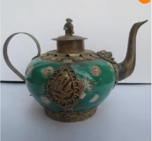 Tibet silver carving Chinese Old Silver Porcelain Teapot monkey Lid shipping tools wedding Decoration Brass
Tibet silver carving Chinese Old Silver Porcelain Teapot monkey Lid shipping tools wedding Decoration Brass